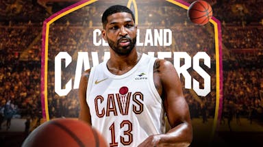 Tristan Thompson with the Cavs arena in the background, suspension