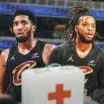 Cavs' Darius Garland and Donovan Mitchell with first-aid kits