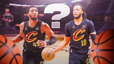 Cavs' Donovan Mitchell on left, Cavs' Darius Garland on right. Place a question mark in the middle.