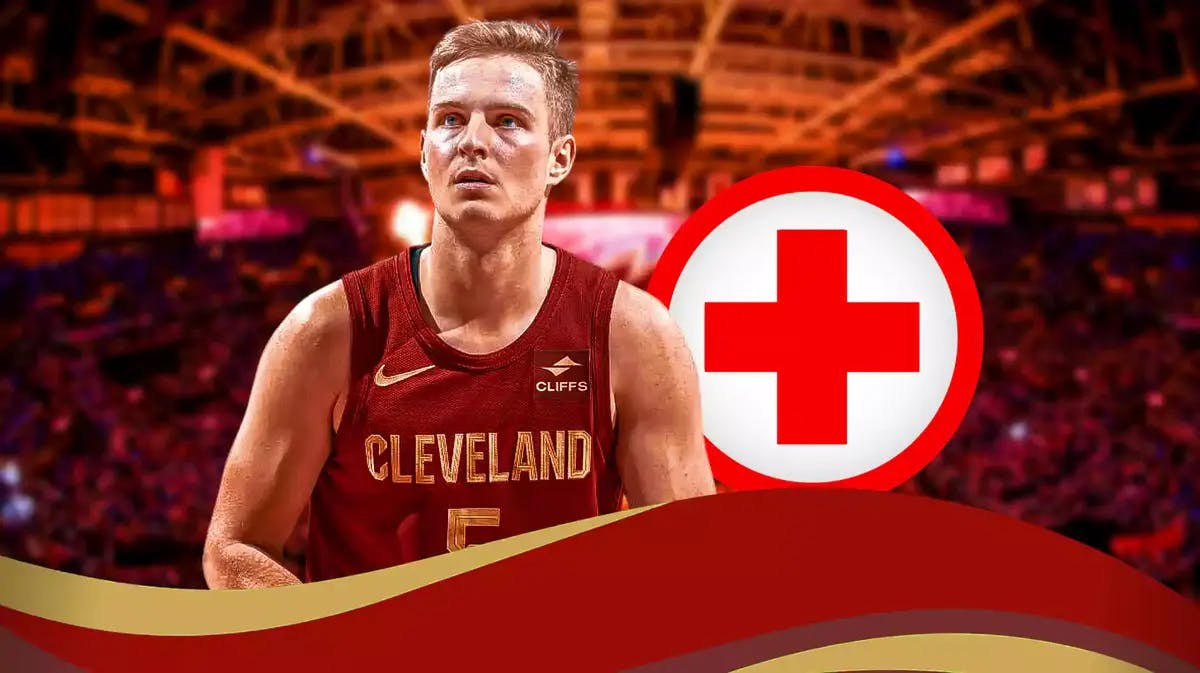 Photo: Sam Merrill in Cavs jersey in action with medical kit beside him