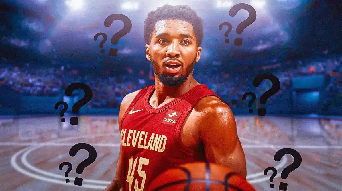 Photo: Donovan Mitchell in Cavs jersey with question marks around him, have him smiling