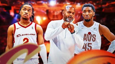 Cavs coach Jb Bickerstaff and Donovan Mitchell with Sharife Cooper looking.